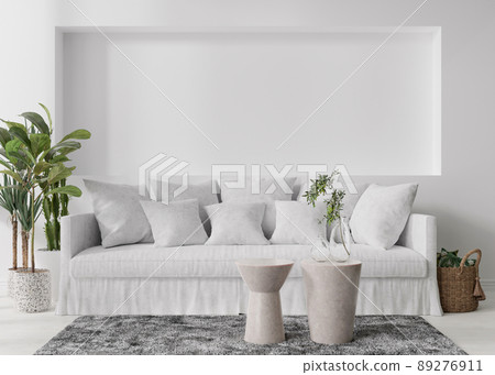 Empty white wall in modern living room. Mock up interior in minimalist, scandinavian style. Free, copy space for your picture, text, or another design. Sofa, plants, tables. 3D rendering. Empty white wall in modern living room. Mock up interior in minimalist, scandinavian style. Free, copy space for your picture, text, or another design. Sofa, plants, tables. 3D rendering. 89276911