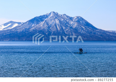 Chitose City, Hokkaido, SUP [April] going on Lake Shikotsu with Mt. Fuppushi in the background 89277255