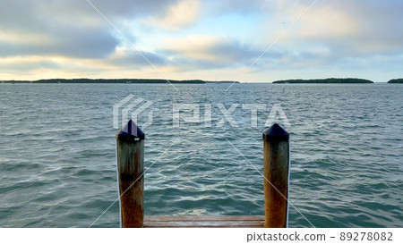 Beautiful jetty on the calm water of the Florida Keys Beautiful jetty on the calm water of the Florida Keys 89278082