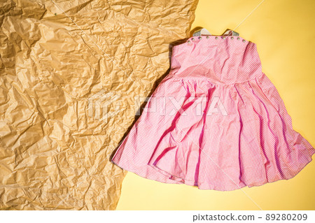 baby pink dress with space for text flat lay baby pink dress with space for text flat lay 89280209