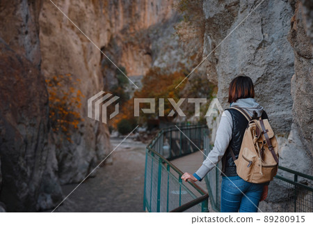 Happy asian woman is enjoy active hiking 89280915