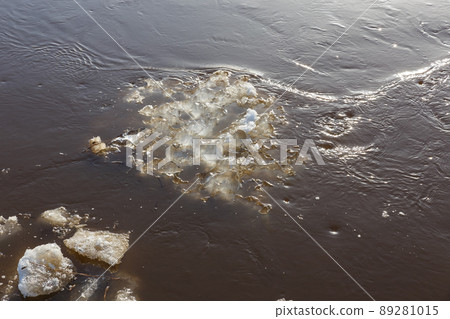ice floe drifts downstream in springtime. spring flood. ice floe drifts downstream in springtime. spring flood. 89281015