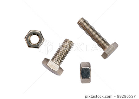 Top view of stainless steel screws and nuts isolated on white background. 89286557