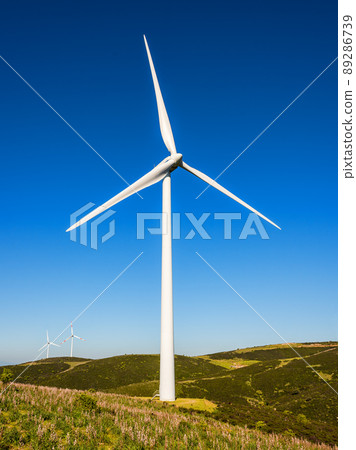 Turbines in a mountain wind farm. Ecological energy production. 89286739