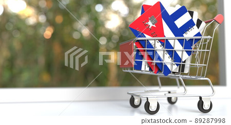Bank card mockups with flags of Cuba in a small shopping cart. 3D rendering Bank card mockups with flags of Cuba in a small shopping cart. 3D rendering 89287998