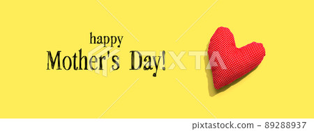 Happy mothers day message with a red heart cushion 89288937