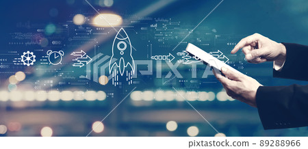 Rapid growth concept with businessman using a tablet 89288966