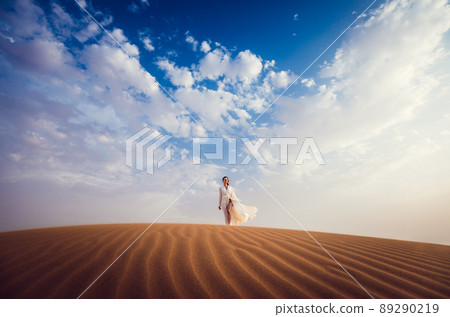 Woman finding freedom in desert 89290219