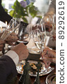 Hands of people toasting in party 89292619