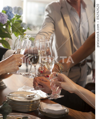Hands of people toasting in party Hands of people toasting in party 89292620