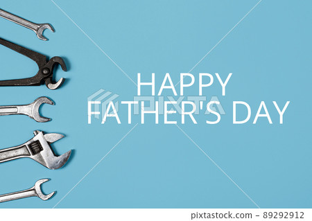 Happy father's day banner. Different wrenches on blue background. 89292912