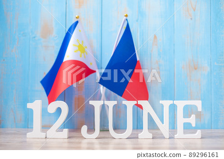 Wooden text of June 12th with Philippines flags. Philippines Independence day and happy celebration concepts Wooden text of June 12th with Philippines flags. Philippines Independence day and happy celebration concepts 89296161