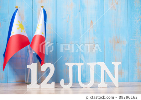 Wooden text of June 12th with Philippines flags. Philippines Independence day and happy celebration concepts Wooden text of June 12th with Philippines flags. Philippines Independence day and happy celebration concepts 89296162