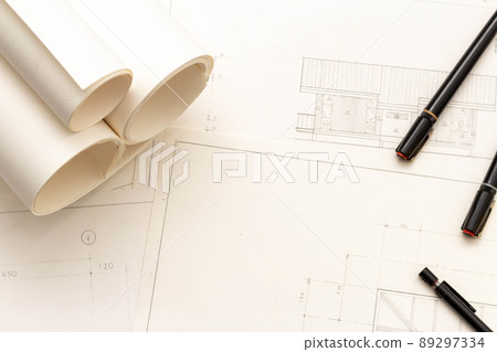 Mockup of architectural concept, Drawing tool and engineer drawing on blueprint with roll blueprint Mockup of architectural concept, Drawing tool and engineer drawing on blueprint with roll blueprint 89297334