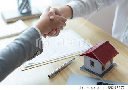 Insurance concept the chattel agent making a perfect deal of estate with his customer 89297372