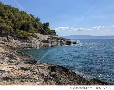 Summer Travel Vacation. View On Beautiful Beach On Greece Shore. Summer Travel Vacation. View On Beautiful Beach On Greece Shore. 89297599