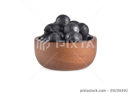 Macadamia charcoal isolated on white background Macadamia charcoal isolated on white background 89298492
