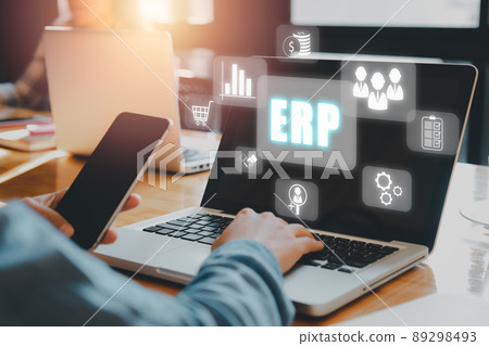 Enterprise Resource Planning ERP, document management concept with icons on virtual screen, Business woman working with laptop computer with icons on virtual screen on office desk. Enterprise Resource Planning ERP, document management concept with icons on virtual screen, Business woman working with laptop computer with icons on virtual screen on office desk. 89298493