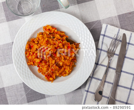 Cabbage barley stew with tomatoes, carrots and onion 89298591