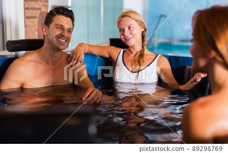 Friends relaxing in spa salon Friends relaxing in spa salon 89298769