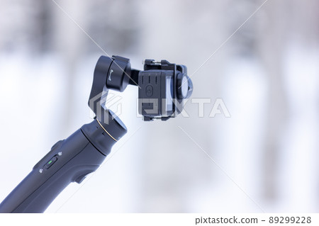 Gimbal camera to shoot winter birch forest 89299228