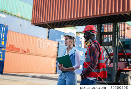 Foreman control Industrial Container Cargo freight ship at industry. Transportation and logistic. Foreman control Industrial Container Cargo freight ship at industry. Transportation and logistic. 89300308