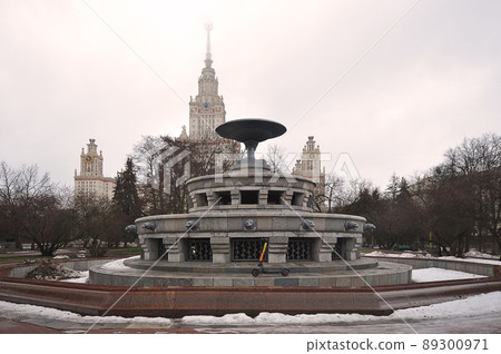 electric scooter on the background of the main building of Moscow State University in Moscow 89300971