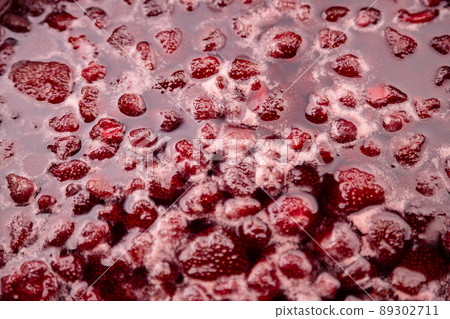 Strawberry jam is boiling, detailed shooting. 89302711