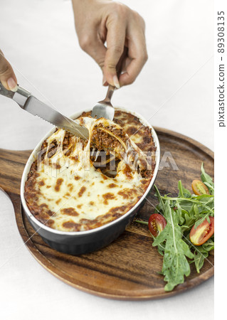 fresh beef lasagna in oven dish on table in rome italy restaurant fresh beef lasagna in oven dish on table in rome italy restaurant 89308135