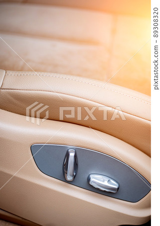 Car interior. Front handle door panel. Car open door window buttons. 89308320