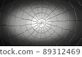 Pieces of glass broken or cracked on grey to black gradient background 89312469