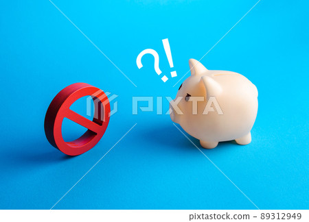 Piggy bank in surprised from the sanctions. Freezing, blocking of assets. Economic embargo. Savings confiscation. Loan disapproval. Bad credit history. Business restrictions. Piggy bank in surprised from the sanctions. Freezing, blocking of assets. Economic embargo. Savings confiscation. Loan disapproval. Bad credit history. Business restrictions. 89312949