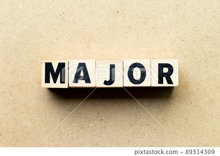 Alphabet letter block in word major on wood background Alphabet letter block in word major on wood background 89314309