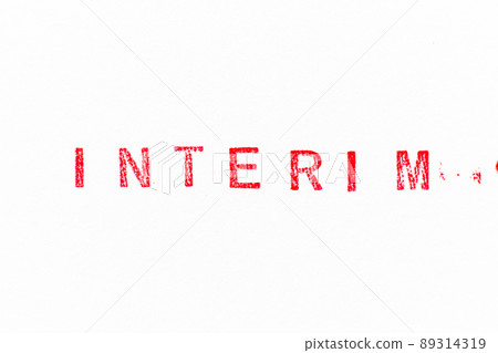 Red color rubber stamp in word interim on white paper background Red color rubber stamp in word interim on white paper background 89314319