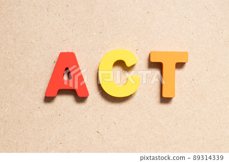 Color alphabet letter in word act on wood background Color alphabet letter in word act on wood background 89314339