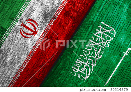 Flags of Iran and Saudi Arabia on the boards. Flags of Iran and Saudi Arabia on the boards. 89314879
