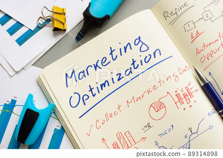 Marks about marketing optimization in the notepad. 89314898