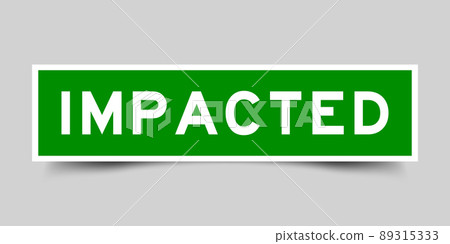Sticker label with word impacted in green color on gray background 89315333