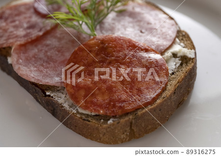 closeup sandwich with dried sausage closeup sandwich with dried sausage 89316275