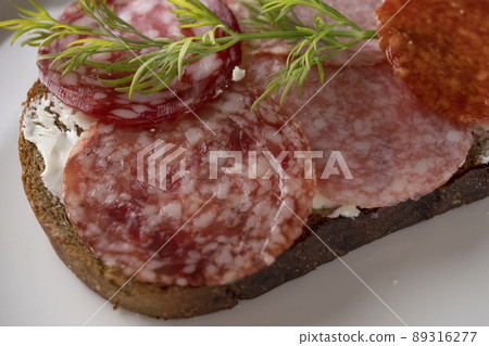 closeup sandwich with dried sausage 89316277