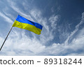 Ukrainian blue and yellow flag opposite the sky 89318244
