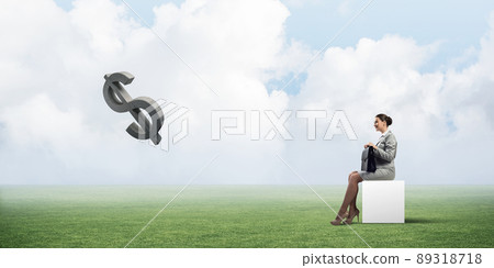 Attractive business lady or accountant outdoors on white box 89318718