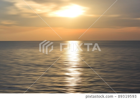 Sunset over the ocean. Blurry abstract art background in digital motion effect. Sunset over the ocean. Blurry abstract art background in digital motion effect. 89319593