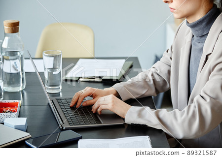 Businesswoman Typing at Keyboard Businesswoman Typing at Keyboard 89321587