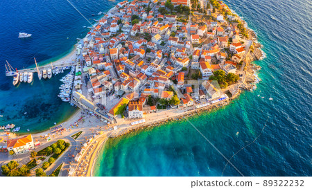 Primosten town, Croatia. View of the city from the air. Seascape with beach and old town. Primosten town, Croatia. View of the city from the air. Seascape with beach and old town. 89322232