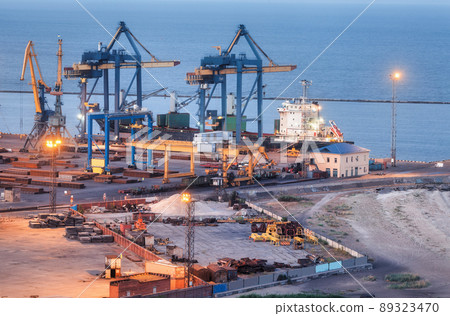 Sea commercial port at night in Mariupol, Ukraine before the war Sea commercial port at night in Mariupol, Ukraine before the war 89323470