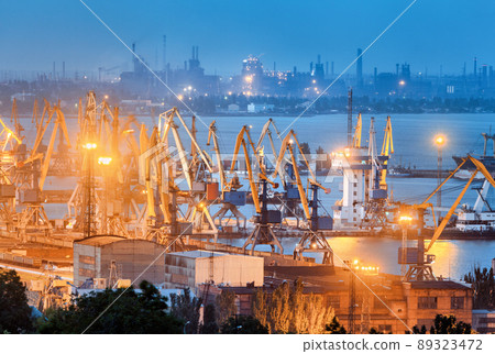 Sea commercial port and steel plant at night in Mariupol, Ukraine before the war 89323472