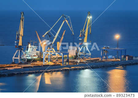 Sea commercial port at night in Mariupol, Ukraine before the war 89323473