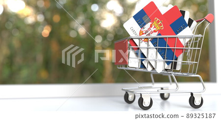 Shopping cart full of credit cards mockups with flags of Serbia. 3D rendering Shopping cart full of credit cards mockups with flags of Serbia. 3D rendering 89325187