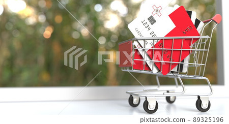 Credit card mockups with flags of Malta in a small shopping cart. Conceptual 3D rendering Credit card mockups with flags of Malta in a small shopping cart. Conceptual 3D rendering 89325196
